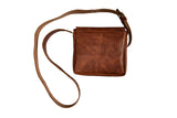 Handmade leather shoulder purse with basket weave front and flap closure - signature chocolate back