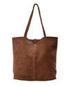 back view of Handmade leather tote bag with strap closure