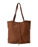 Front view of Handmade leather tote bag with strap closure
