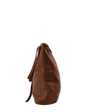 Front view of Handmade leather tote bag with strap closure