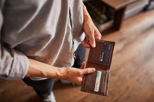 Man holding Handmade luxury leather bi-fold wallet