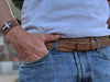 Man wearing Handmade leather belt with hidden zipper pocket to hold cash in color stone
