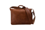 Handmade leather luxury work briefcase with two buckle closures and long shoulder strap back view in signature chocolate