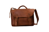 Handmade leather luxury work briefcase with two buckle closures and long shoulder strap front view in signature chocolate